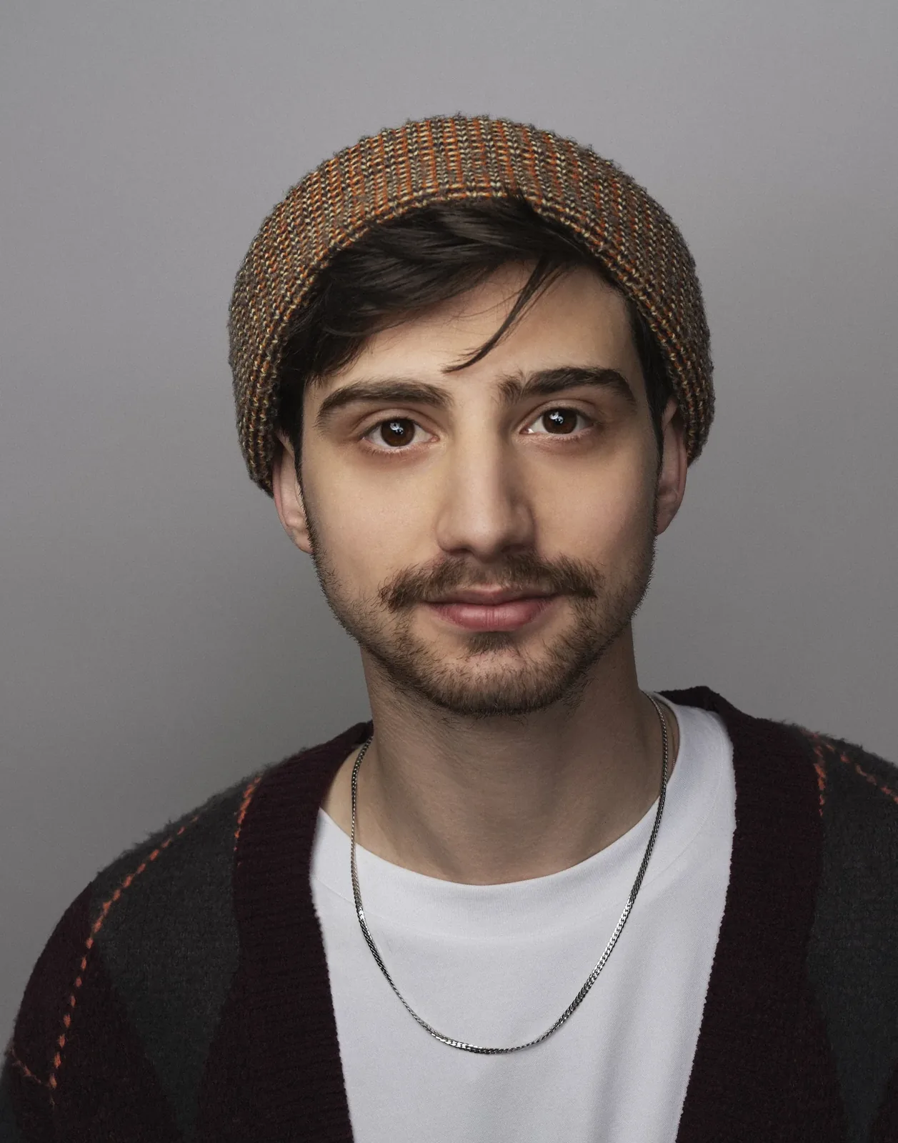 Headshot in a knit hat