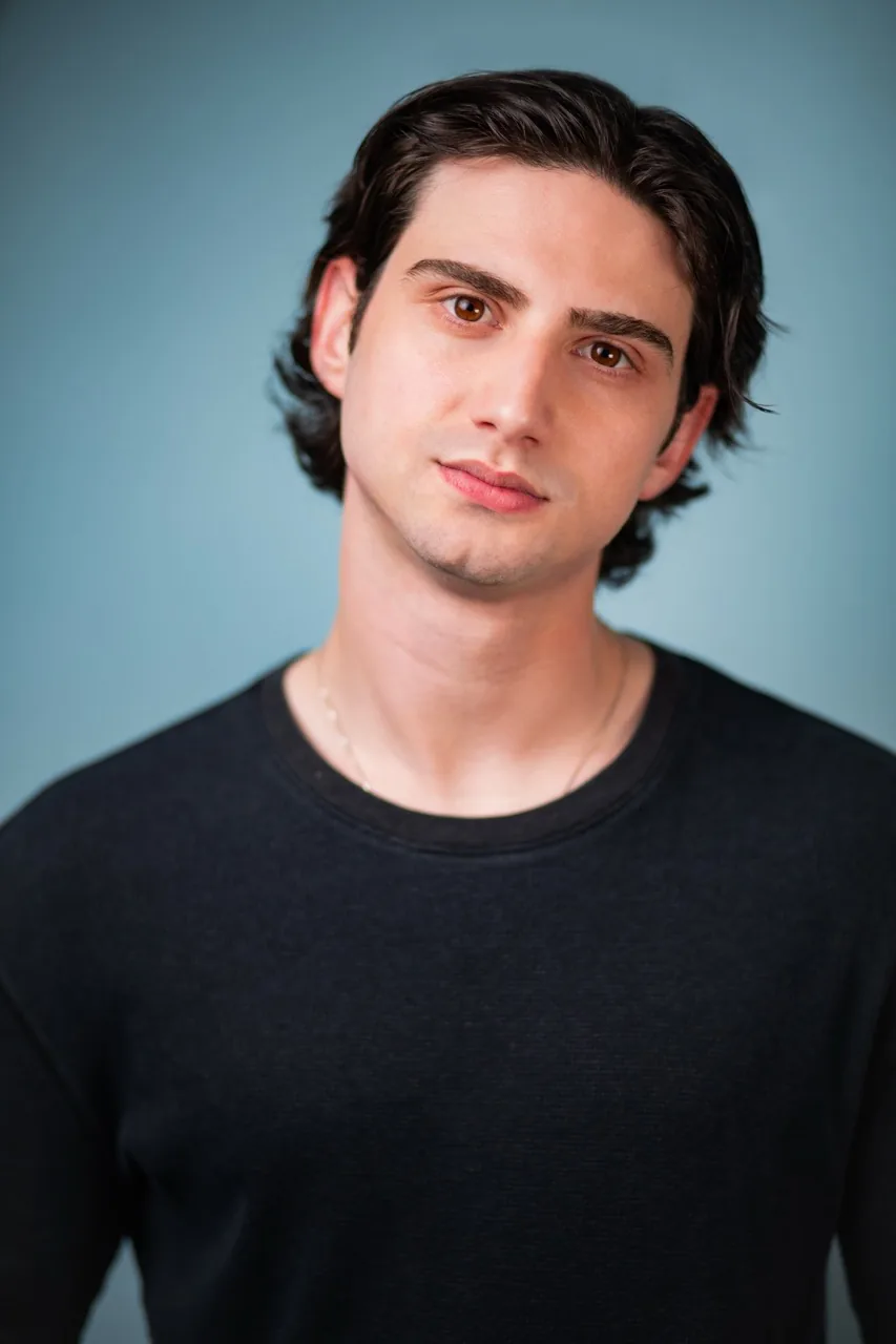 Headshot, light blue background