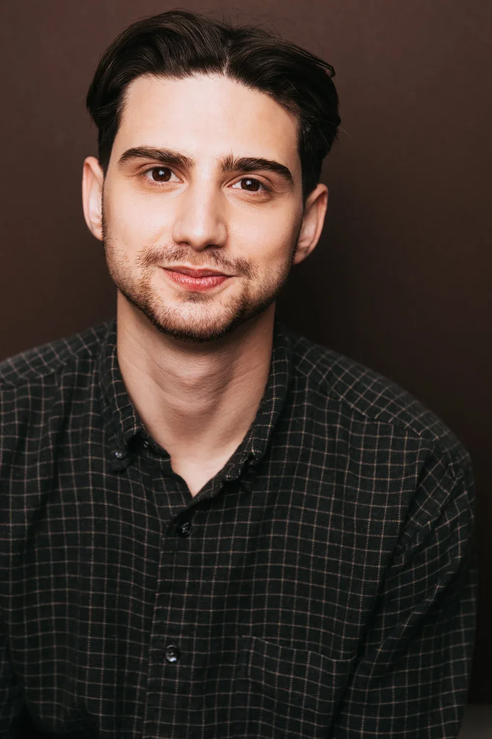 Headshot, brown background