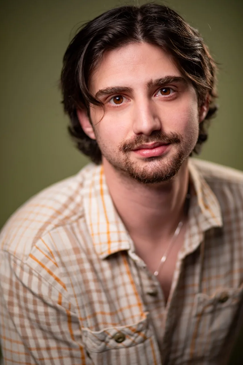 Headshot, olive background